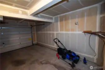 2 car garage, electric lawnmower conveys!