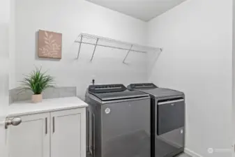 Laundry room comes WITH Newer Washer and Dryer!