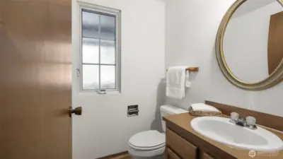 Convenient main floor half bath, perfect for guests.