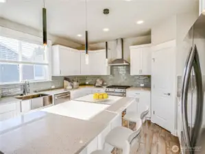 Gas cooking. Quartz counters. Generous Island.