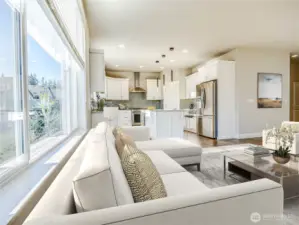 Large kitchen with isalnd relates to entertaining relaxation space