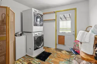 Laundry room w/ stacked Washer & Dryer