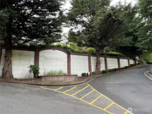 Entrance to Regentwood condo association. The complex is on the hillside with a private greenbelt, and trails. Centrally located near #522, I-5, #405, and downtown Bothell, trails, and parks, shopping, and restaurants. Juanita Beach, and Woodinville are nearby.