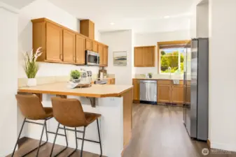 Large kitchen with new appliances, sink and faucet!
