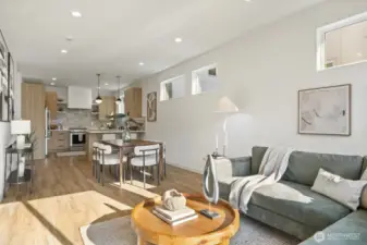Great room features open concept and is flooded with natural