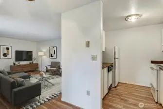 Kitchen and Living Room.  *Home is virtually staged.