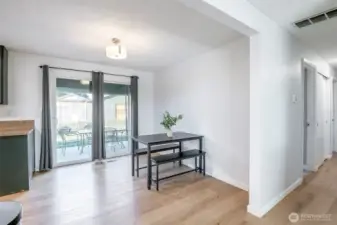 Eating area off of kitchen. Slider leads to backyard.