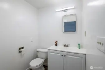 Half bath off bonus room area.