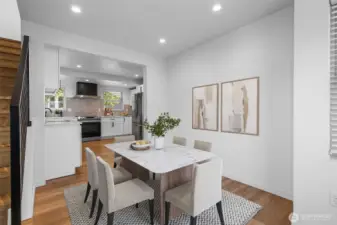 A bright and welcoming space to connect over meals. Virtually staged.