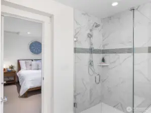 Wonderful walk-in shower with seamless glass surround.