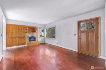 Gas fireplace and in wall storage in main area