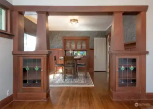 Gorgeous built-ins and stained glass coverings capture this home's charm and character.