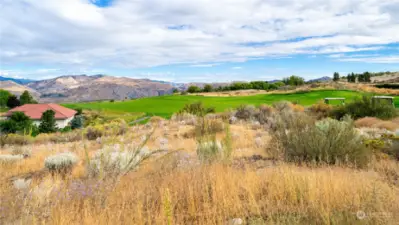 Prime location right on the 4th hole with mountain views!