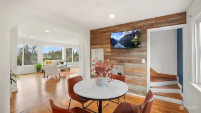 Rustic accent wall warms the space and offers clever shelving.