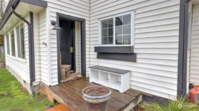 Charming porch, leads to the living room.