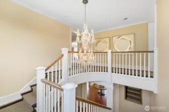 This grand staircase is one of two staircases servicing the second floor. You cannot appreciate the high ceilings or impressive spaces until you experience it in person.