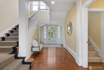 The grand entry way looks to both the original front door and the modern day front door.