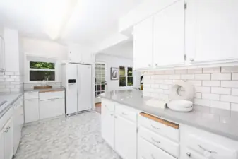 The kitchen just had a full facelift with bright subway tiles and miles of quartz countertops. It’s the center of attention for all gatherings with the family room offers intimate time with guests as well as quick access to the dining room & backyard patio.