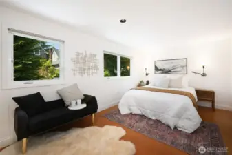 The upstairs is a lovely retreat boasting a large primary bedroom