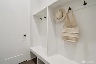 Built ins leading to garage.