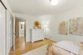 This bedroom also lives large and is conveniently located just across the hallway from the full bathroom.