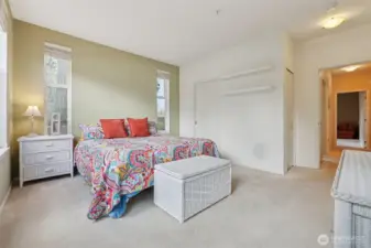 Primary bedroom as a walk in closet and a second linen closet