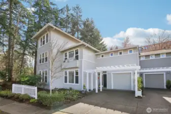 Single Car garage and driveway.  Lower corner single level condo.