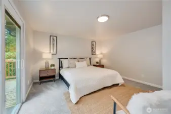 4th Bedroom/Primary with 3/4 bath and slider leading to Large deck!