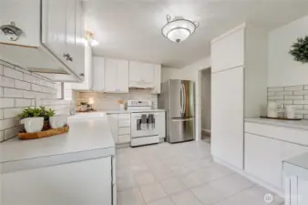 Lots of counter space and many cabinets to include pantry cabinet with pull outs