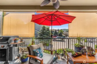 Three included sun shades fasten to balcony railing for wind resistant outdoor entertaining and comfort.