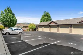 One assigned uncovered parking space