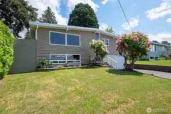 Situated above the street, this home feels private and secure.
