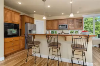 Fresh refinished hardwood floors with large walk-in pantry