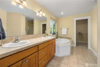 5 piece primary suite with pocket door entrance.