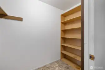 Guest entry closet has additional storage