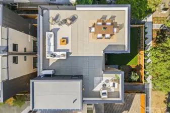 Huge Rooftop deck provides expansive outdoor entertaining space with views of Puget Sound and Olympic Mountains