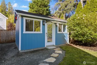 The detached studio is equipped with heating and cooling and engineered hardwood floors.