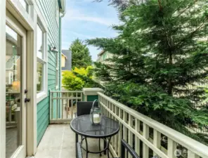Private balcony deck off of dining and living space.