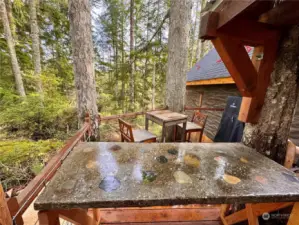 Casual outdoor dining, prep table.