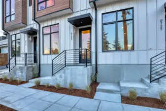 Modern lines and bold architecture welcome you home. This private front entry feels intentional, elevated, and uniquely yours.