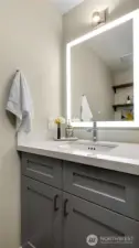 Powder room with heated/lighted mirror