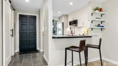 Entry & eating bar.  Whole home has been remodeled.