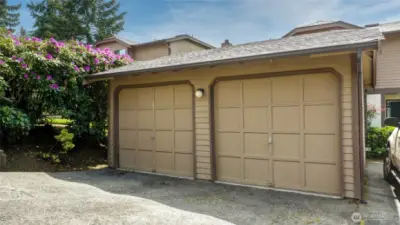 Single car garage. Door on the right with additional parking space in front