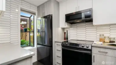 Kitchen remodeled in 2022 with new black stainless appliances