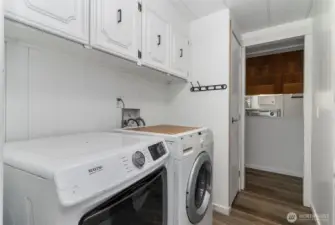Laundry room with cabinets