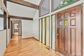 Wide hallways, large entry, lots of windows and sidelights for bright living space!