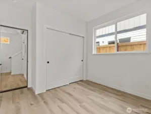 Rare main level bedroom, office or flex space! (model unit)
