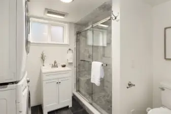 Lower level 3/4 bath with full size washer and dryer