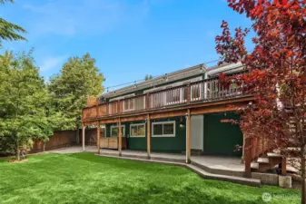 Lovely, level rear yard with plenty of patio, lawn & garden space