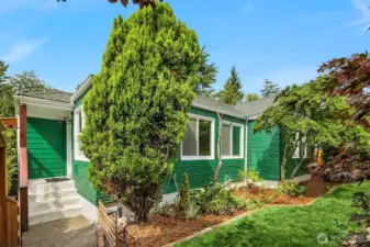 Front entry within the fully fenced front yard